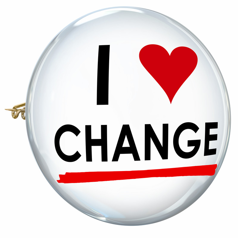 lapel pin says i love change